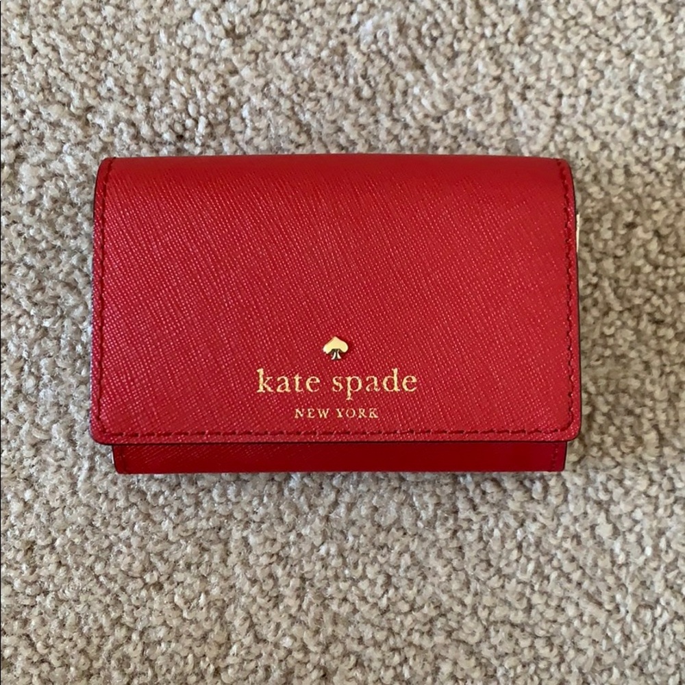 Compacted Kate spade wallet